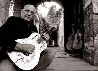 Inspiring the Next Generation: Thelwall Guitarist Teaching Music news-30112024-231858