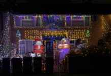 Eye-Catching Inflatable Donut Spaceship and Pug: A Festive Homeowner’s Display eye-catching-nflatable-donut-spaceship-and-pug-a-festive-homeowners-display