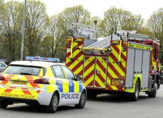 securing-unstable-shop-sign-and-loose-power-cable-during-storm-darragh-firefighters-rescue-efforts